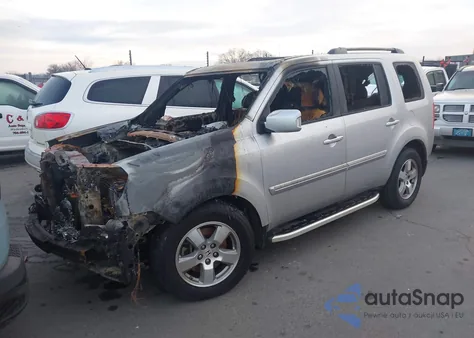 2011 Honda Pilot Touring z USA, uszkodzony, nr VIN 5FNYF4H9XBB032423